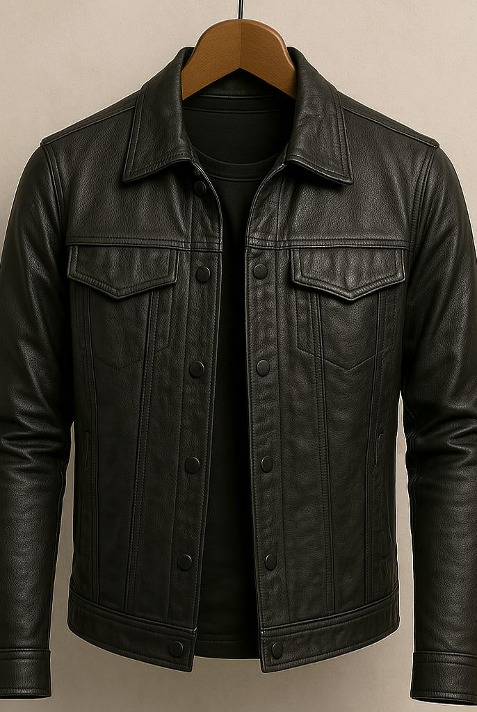 Black leather jacket on a hanger against a beige background