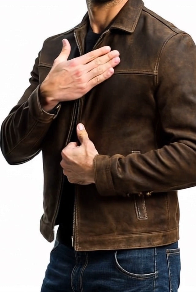 Brown leather jacket worn by a person on a white background