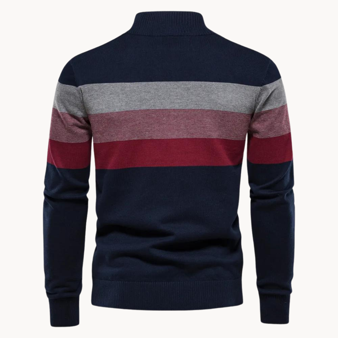 Navy blue sweater with red and gray horizontal stripes on a white background