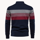 Navy blue sweater with red and gray horizontal stripes on a white background