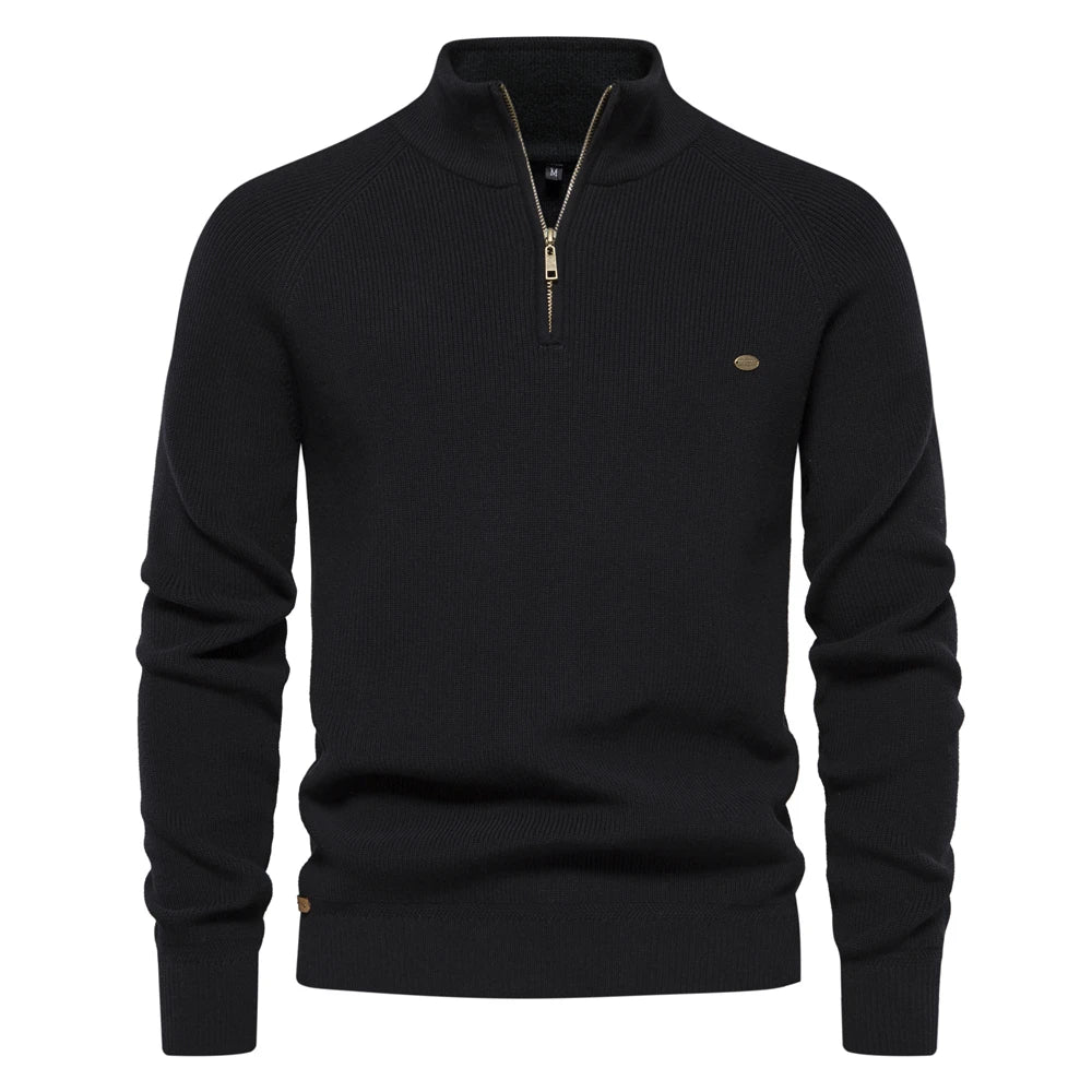 Black sweater with a zipper on a white background