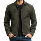 Green suede jacket worn by a person on a white background