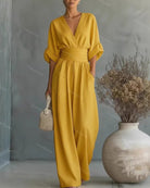 Dames Jumpsuit met Diepe V-hals, Sjerband en Wijde Pijpen Geel