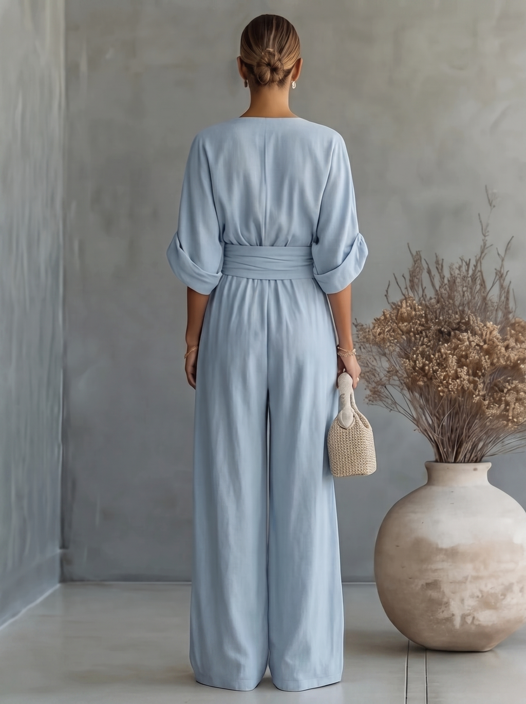 Tuta casual da donna con scollo a V e pantaloni a gamba larga