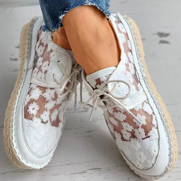 Scarpa ortopedica elegante con motivo floreale