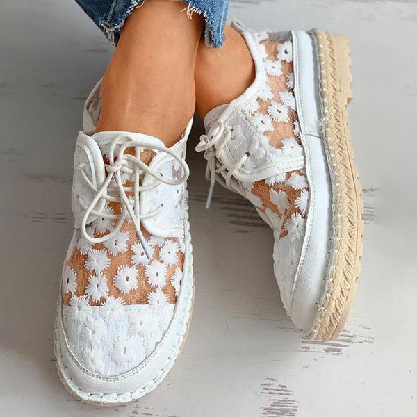 Scarpa ortopedica elegante con motivo floreale