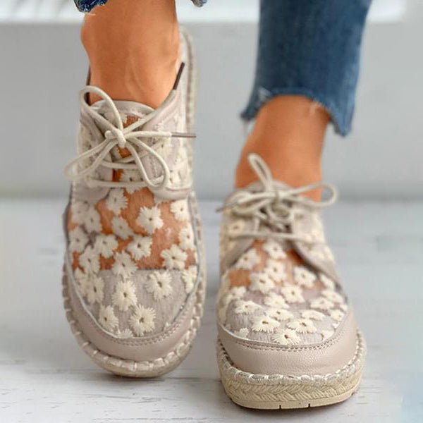 Scarpa ortopedica elegante con motivo floreale