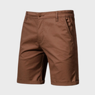 Brown shorts on a light gray background